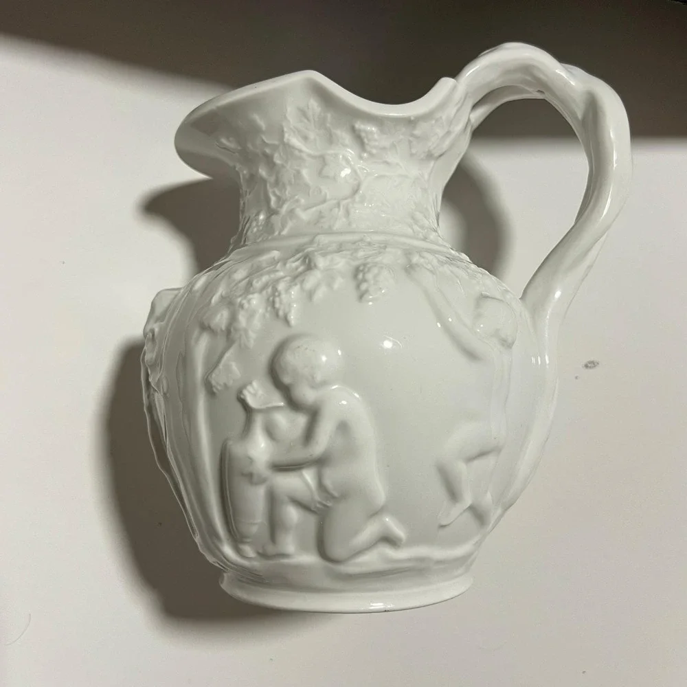 Vintage White Glass Cherub Pitcher Embossed Grape Vine Relief molded Victorian‎